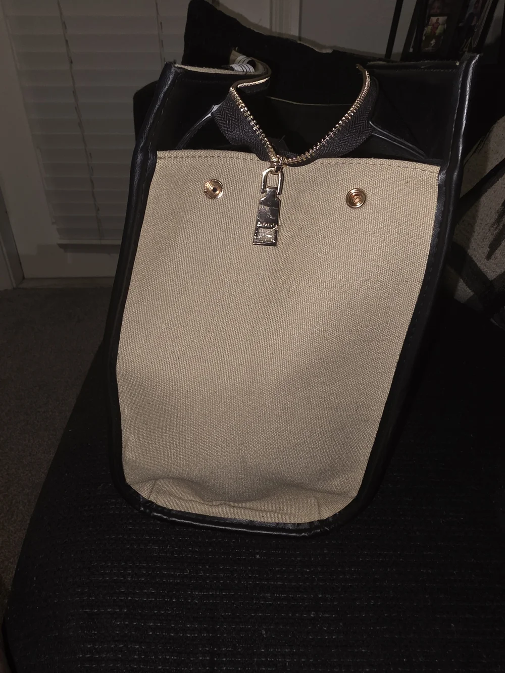 bebe Tan Canvas Duffel with Black Branded Straps